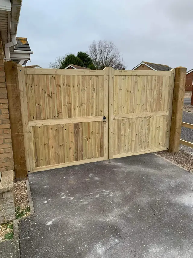 Wide timber driveway gates