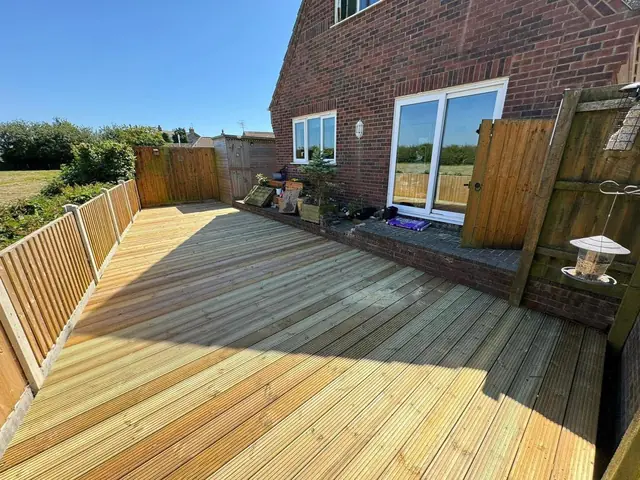 Decking with fencing around a patio