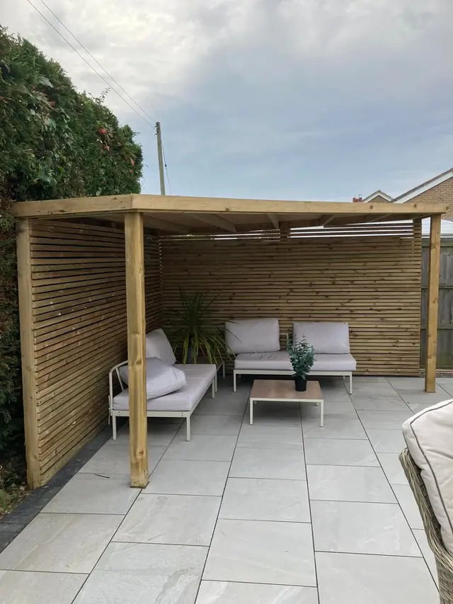 Pergola over a patio seating area