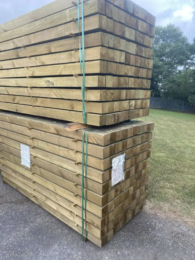 Stacked treated timber ready for delivery